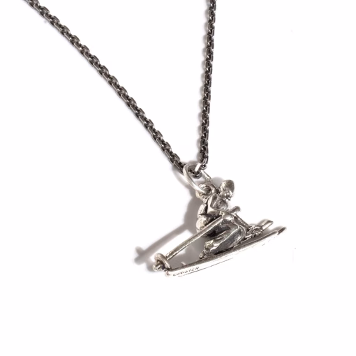 Silver skier pendant